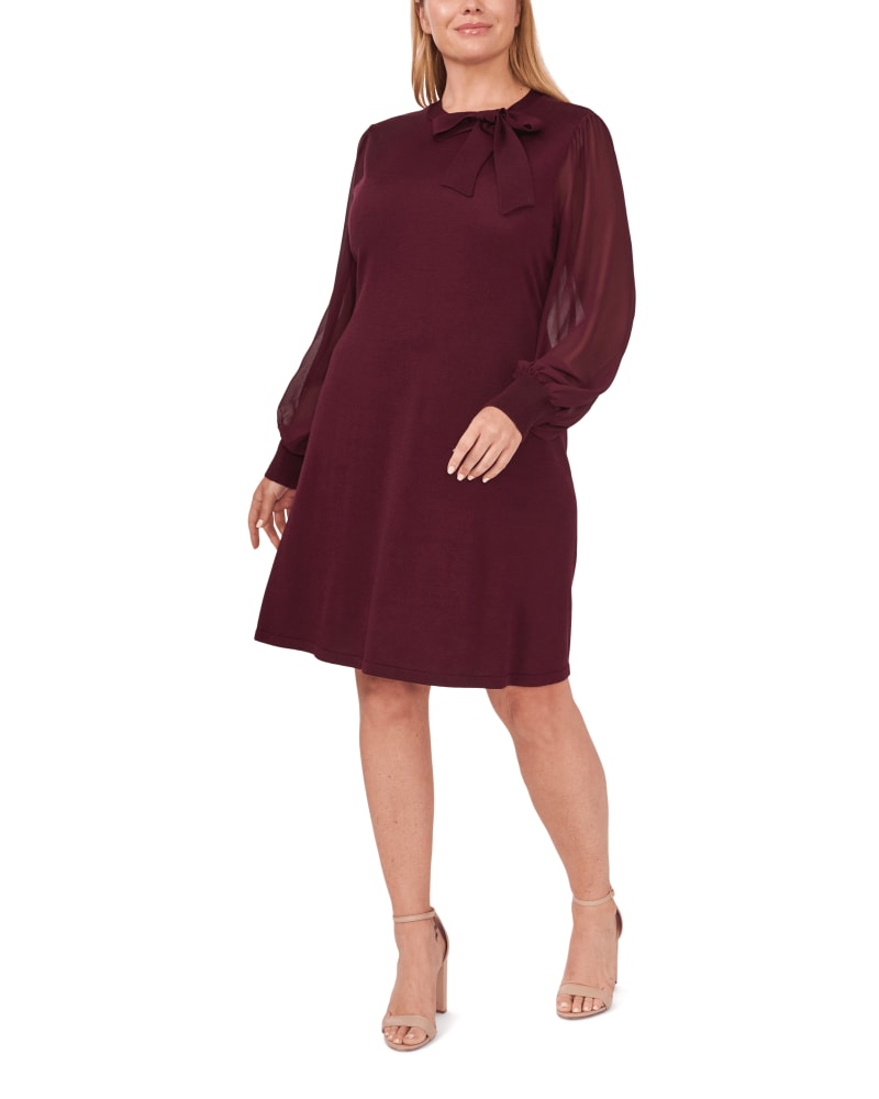 Front of a model wearing a size 1X Ariana Bow Sweater Dress in 680-RICH CABERNET by CeCe. | dia_product_style_image_id:263891